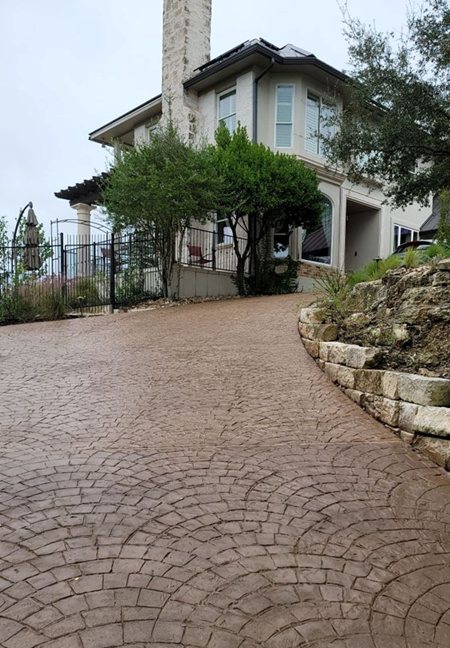 stained concrete driveway Austin